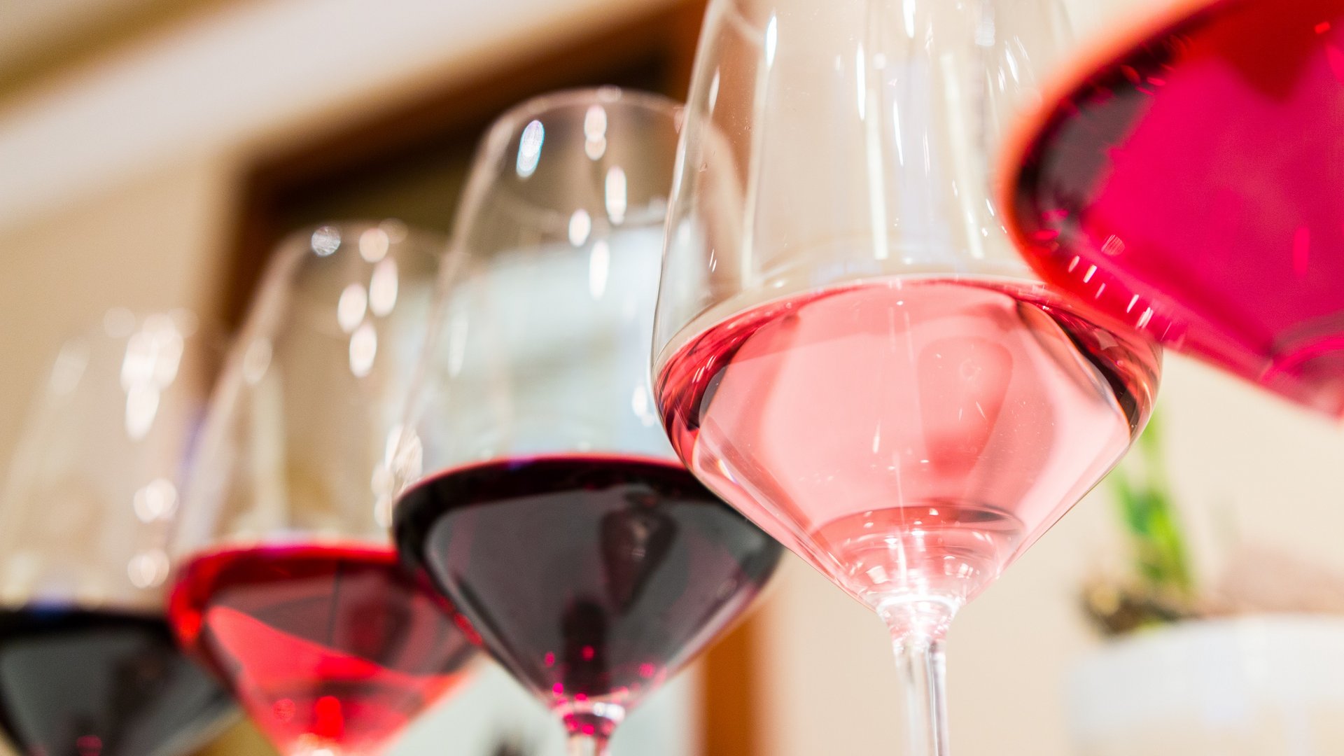Valentine's Day 2026 Close-up of several wine glasses with red and rosé wine
