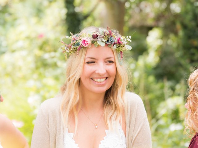 Romantik Hotel Hirschen: picture gallery Smiling woman wearing a flower crown outdoors in a garden