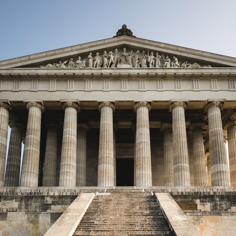 Culture & Attractions Around Regensburg Classical Greek building with columns and statues on the pediment