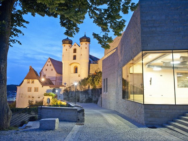 Romantik Hotel Hirschen: picture gallery Historic castle complex at dusk with illuminated buildings