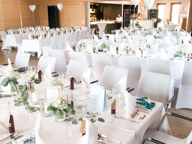 Romantik Hotel Hirschen: picture gallery Festively decorated event room with white tablecloths and chairs