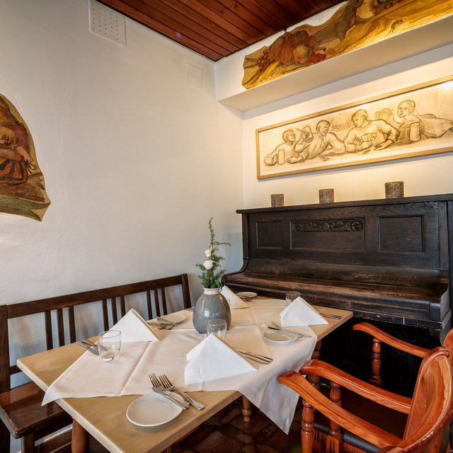 Hotel in Upper Palatinate: Get a breath of holiday air! Cozy dining area with piano and decorative paintings on the wall