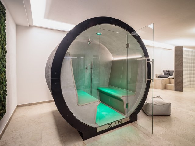 Romantik Hotel Hirschen: picture gallery Modern sauna cabin with green LED lighting and glass front