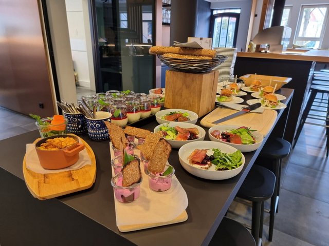 Romantik Hotel Hirschen: picture gallery Buffet with appetizers, desserts, and small sandwiches on a table