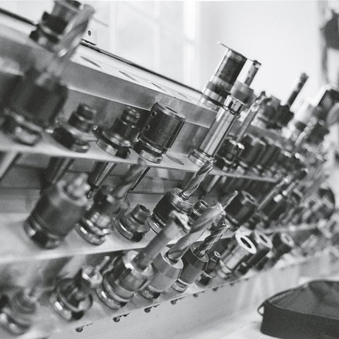 Looking for a hotel with bike rental in Bavaria? Row of metal milling tools in a workshop